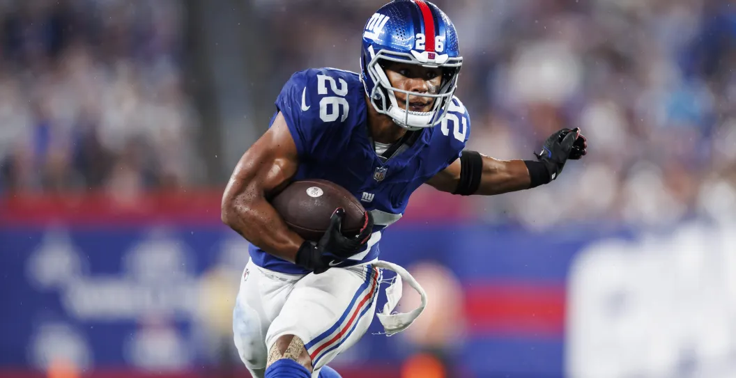 EAST RUTHERFORD, NEW JERSEY - SEPTEMBER 10: Saquon Barkley #26 of the New York Giants carries the ball during an NFL football game against the Dallas Cowboys at MetLife Stadium on September 10, 2023 in East Rutherford, New Jersey.