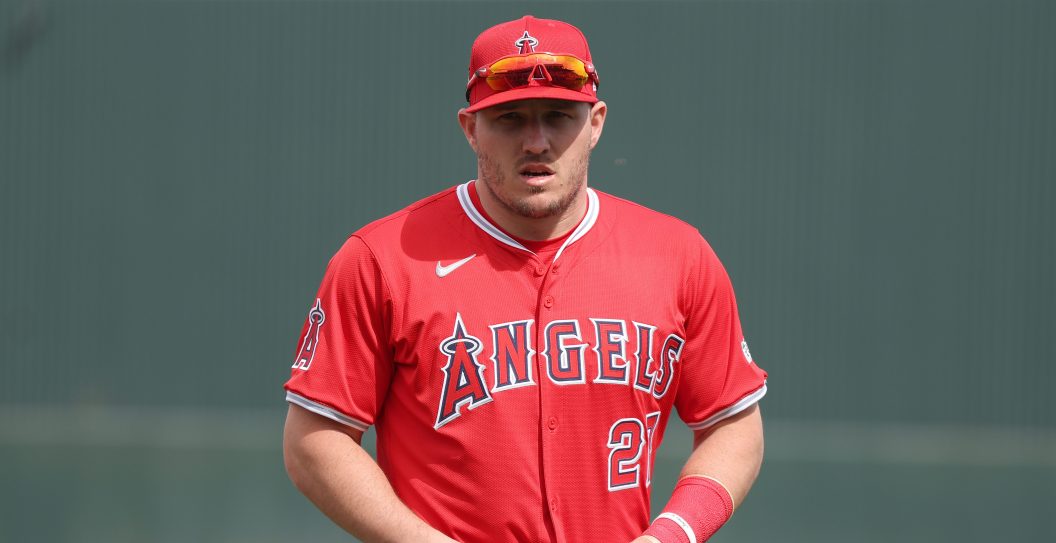 TEMPE, ARIZONA - FEBRUARY 24: Mike Trout #27 of the Los Angeles Angels looks on during a spring training exhibition against the Los Angeles Dodgers at the Peoria Sports Complex on February 24, 2024 in Tempe, Arizona.