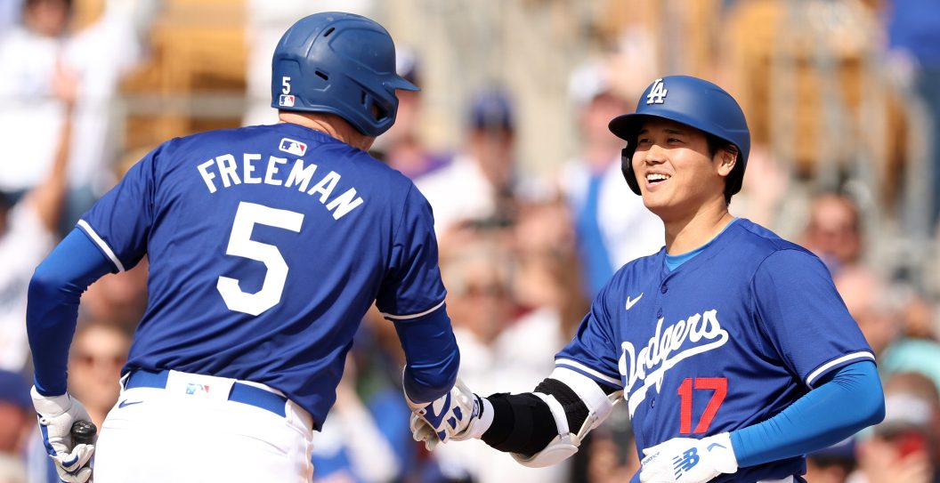 GLENDALE, ARIZONA - FEBRUARY 27: Shohei Ohtani #17 celebrates with Freddie Freeman #5 of the Los Angeles Dodgers after hitting a two-run home run in the fifth inning inning during a game against the Chicago White Sox at Camelback Ranch on February 27, 2024 in Glendale, Arizona.