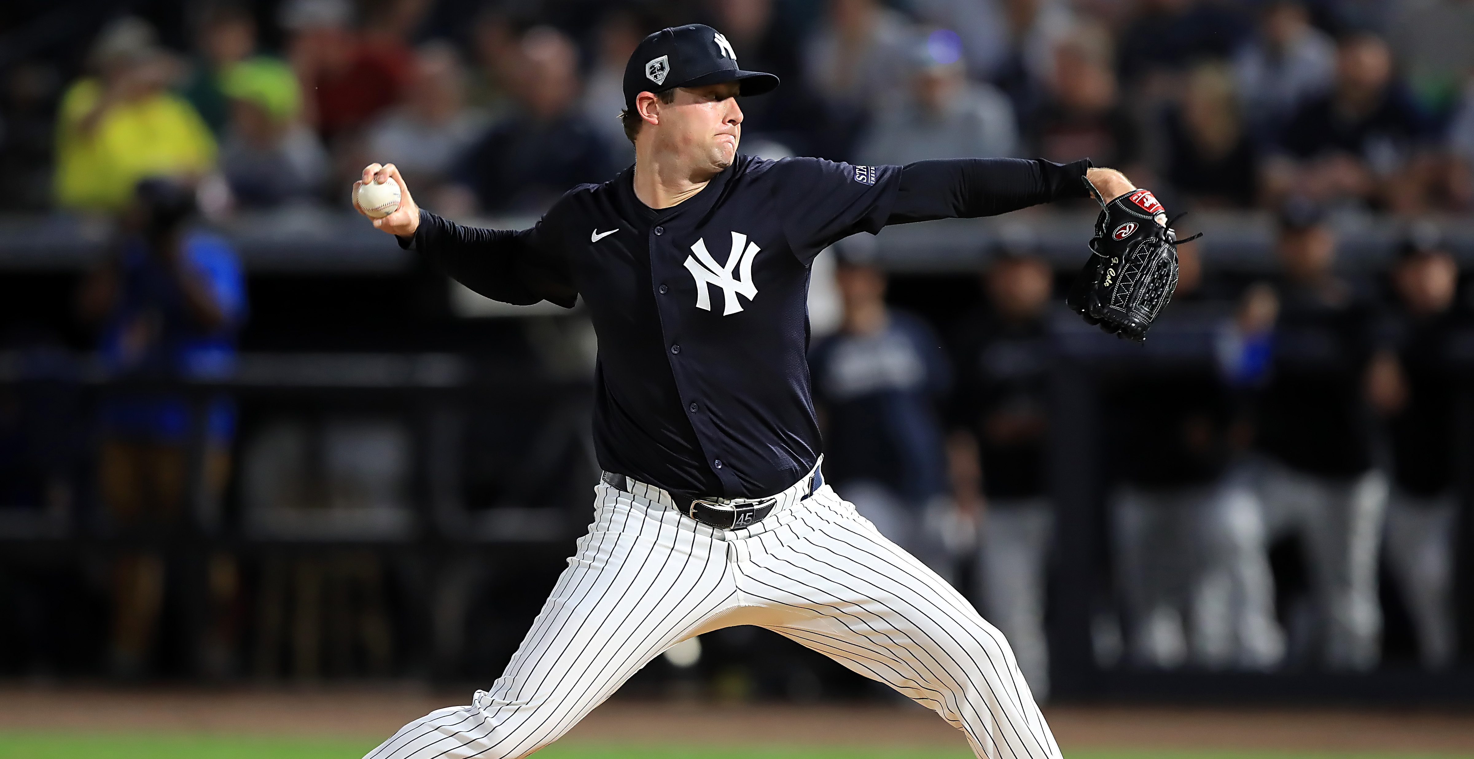 TAMPA, FL - MARCH 01: New York Yankees Pitcher Gerrit Cole (45) delivers a pitch to the plate during the spring training game between the Toronto Blue Jays and the New York Yankees on March 01, 2024 at George M. Steinbrenner Field in Tampa, FL.