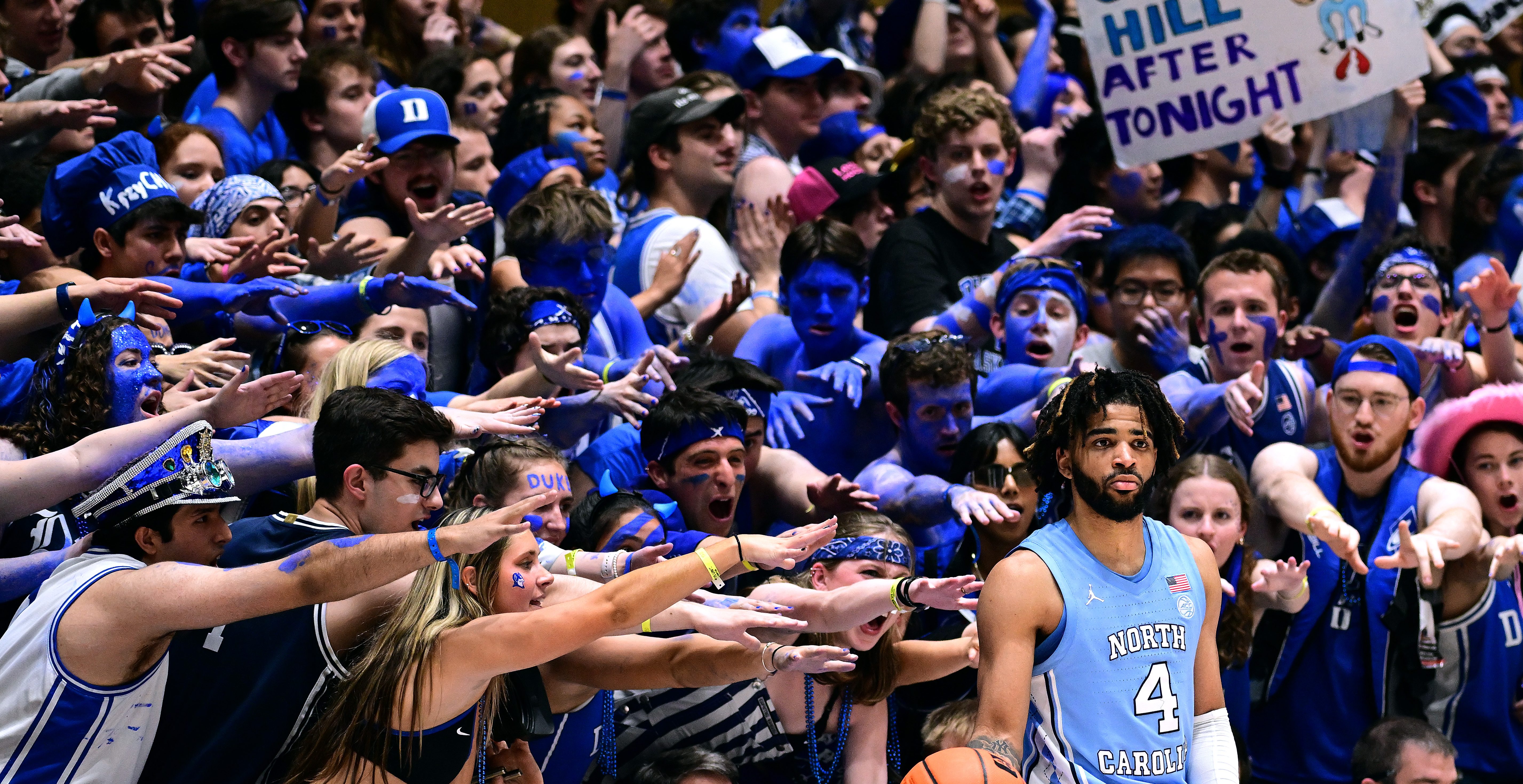 DURHAM, NORTH CAROLINA - MARCH 09: The Cameron Crazies taunt RJ Davis #4 of the North Carolina Tar Heels during the second half of the game against the Duke Blue Devils at Cameron Indoor Stadium on March 09, 2024 in Durham, North Carolina.The Tar Heels won 84-79.