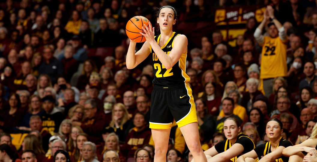 MINNEAPOLIS, MINNESOTA - FEBRUARY 28: Caitlin Clark #22 of the Iowa Hawkeyes receives a pass against the Minnesota Golden Gophers in the fourth quarter at Williams Arena on February 28, 2024 in Minneapolis, Minnesota. The Hawkeyes defeated the Golden Gophers 108-60.