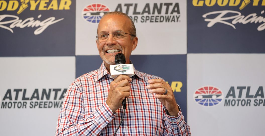 HAMPTON, GEORGIA - JULY 09: NASCAR commentator, Kyle Petty, (L) speaks to the media during a press conference for Goodyear's 2000th NASCAR Cup Series Victory prior to the NASCAR Cup Series Quaker State 400 Available at Walmart at Atlanta Motor Speedway on July 09, 2023 in Hampton, Georgia.