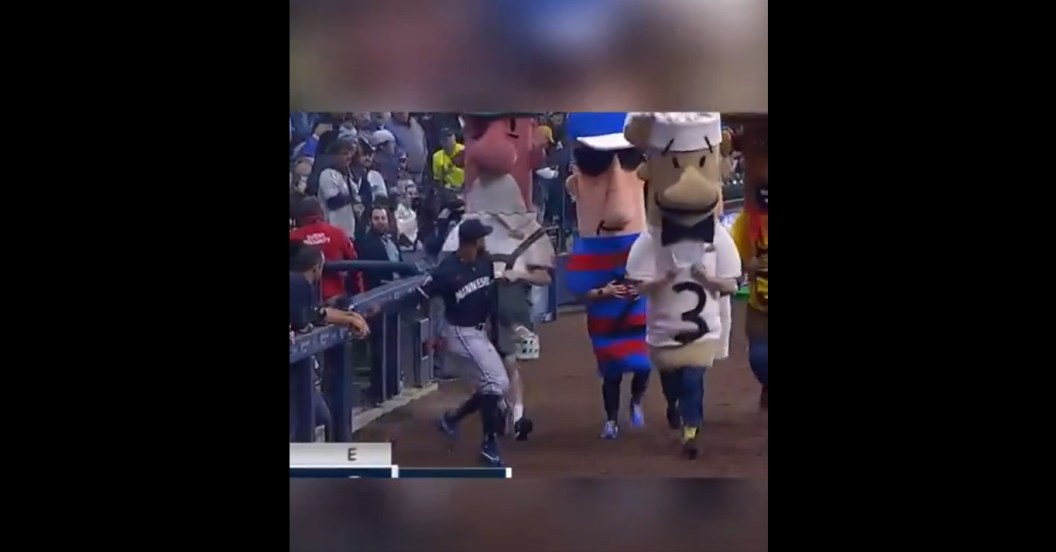 Minnesota Twins outfielder Byron Buxton barely eluded an incoming sausage. (Cut4/Screengrab)