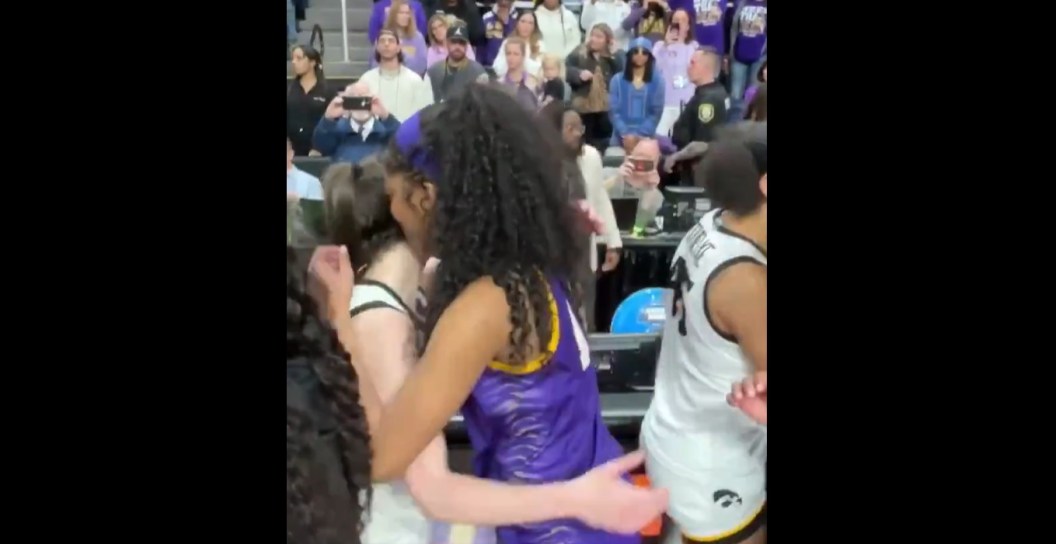 LSU's Angel Reese and Iowa's Caitlin Clark embrace after their NCAA tournament game. (ESPN/Screengrab)